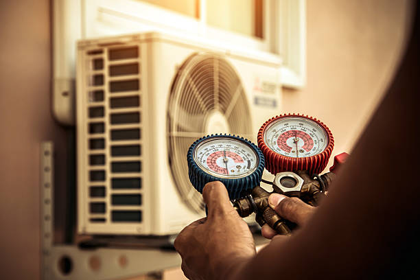 Professional Air Conditioning Service technician working in Connelly Springs, NC